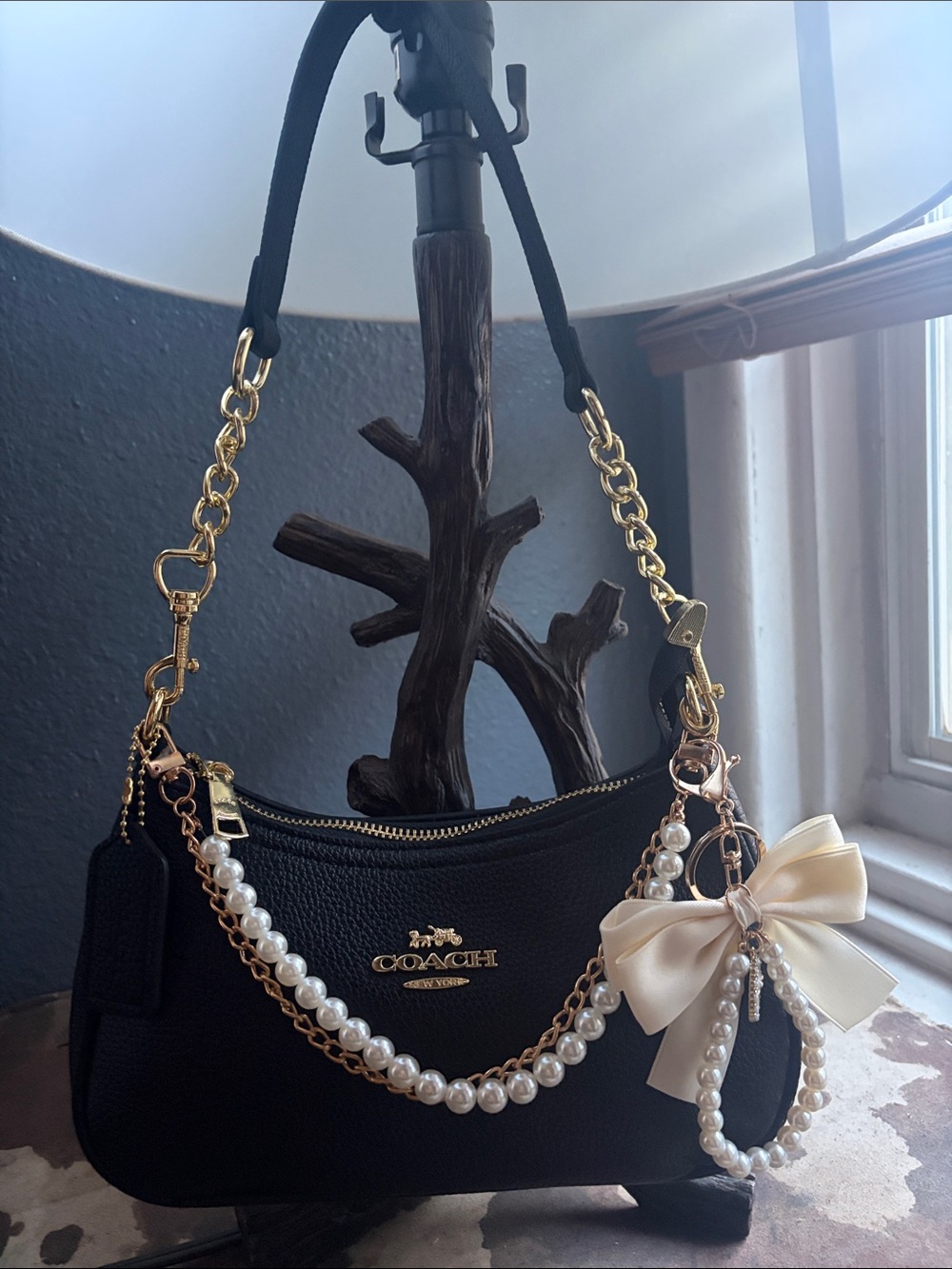 Coach Black Pebbled Leather Shoulder Bag with Gold Hardware & Pearl Charm
